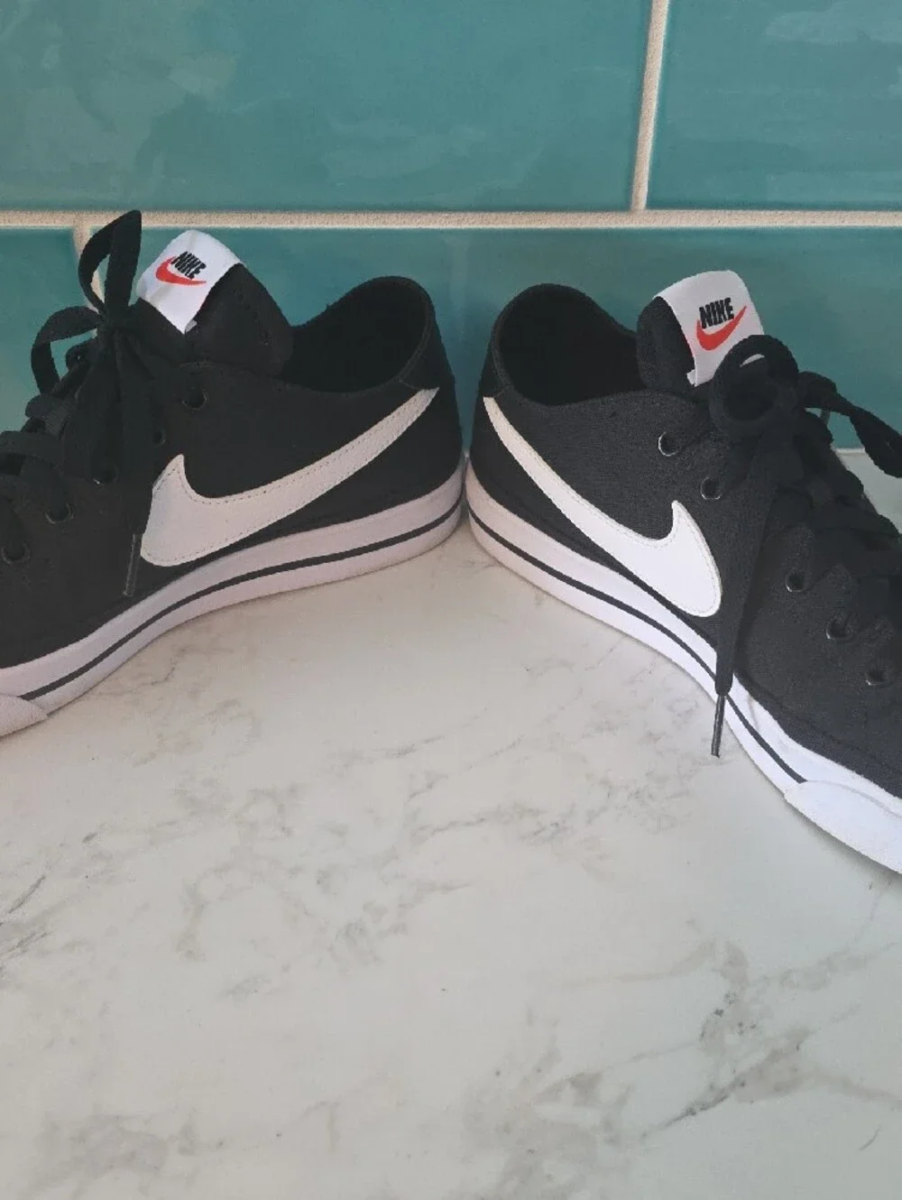 Nike Men's Black & White Low-Top Sneakers with White Swoosh